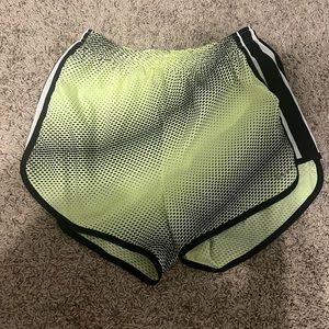 Green Nike running shorts. Size small.
